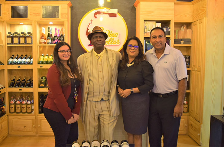 From left,  Ms Rema Ramlall, staff of Wine Cellar, Mr Guy Griffith, PRO LGC; Mrs Marcia Nadir-Sharma, CEO of Wine Cellar; and Mr Aleem Hussain, president of LGC,