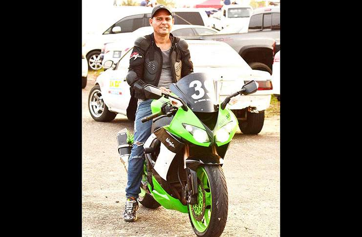 Superbike racer, Mark 'Mad Max' Menezes poses on his 600cc CBR during a previous meet.