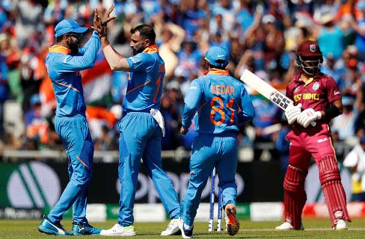 Two-time champions India stood on the cusp of securing a spot in the Cricket World Cup semi-finals after they stretched their unbeaten run in the tournament with a clinical 125-run victory against West Indies that eliminated the Caribbeans on Thursday. (Reuters photo)