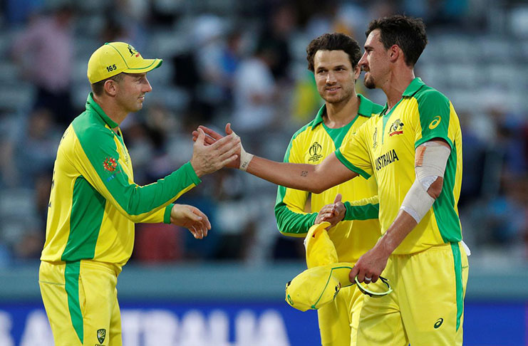 Australia's Mitchell Starc celebrates winning the match by taking the wicket of New Zealand's Mitchell Santner. (Action Images via Reuters/John Sibley)