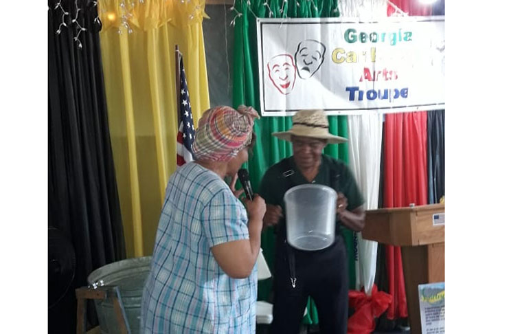 The two-man cast performing a skit titled, `There’s a hole in the bucket ‘