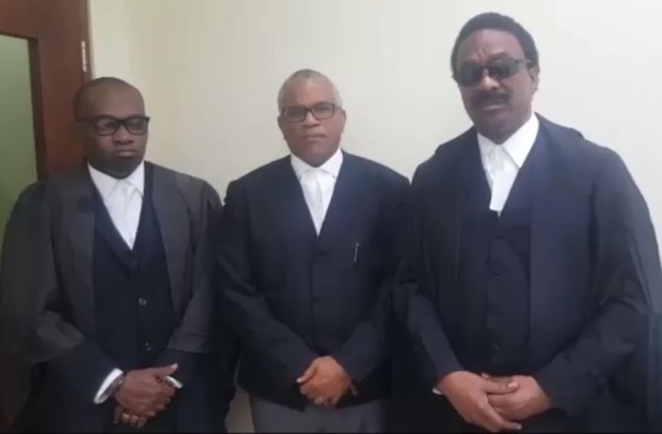 From R-L: Attorney General Basil Williams, Senior Counsel Eamon Courtenay and Roysdale Forde- the attorney that represented Joseph Harmon, standing outside courtroom shortly after the consequential orders were delivered by the President of the CCJ, Justice Adrian Saunders.