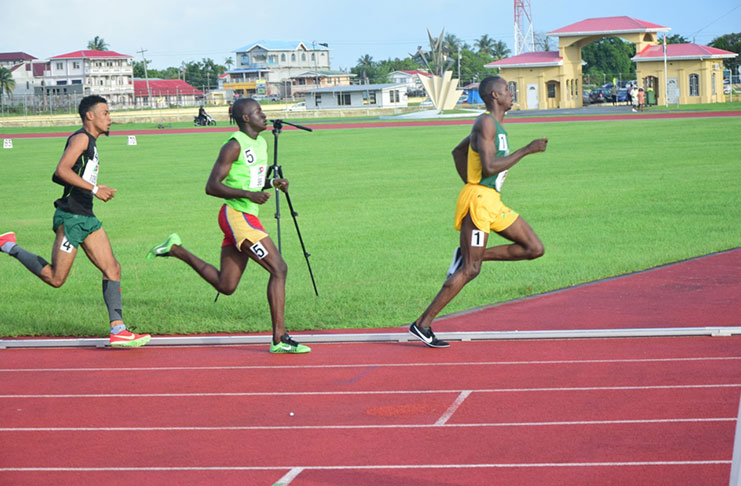Devaun Barrington (first from right) is in cruise control in the men’s 800 metres at the 2019 AP Invitational.