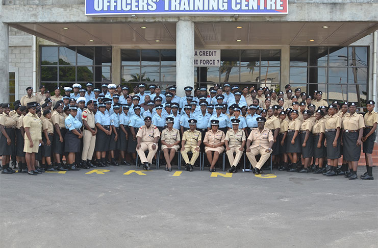 Assistant Commissioner and Force Training Officer, Clifton Hicken [third from left] with other senior officers of the Guyana Police Force (GPF) and the graduates from the training course