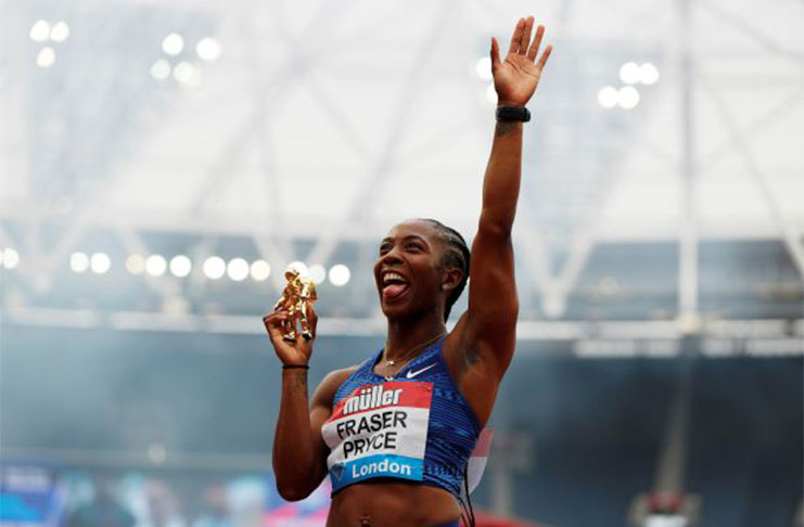 London Stadium, London, Britain - Jamaica's Shelly-Ann Fraser-Pryce poses as she celebrates winning the Women's 100m race Action Images via Reuters/John Sibley