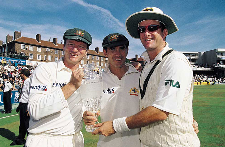 Justin Langer, centre, with Steve and Mark Waugh after winning the 2001 Ashes. (Getty)