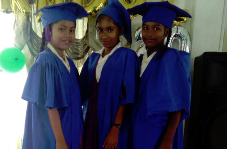 The three top pupils of Bamia Primary School