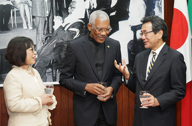 President David Granger and new Japan Ambassador to Guyana, Tatsuo Hirayama (right) and
Mrs Sachiko Hirayama share a light moment at the accreditation ceremony (Ministry of Presidency photo)