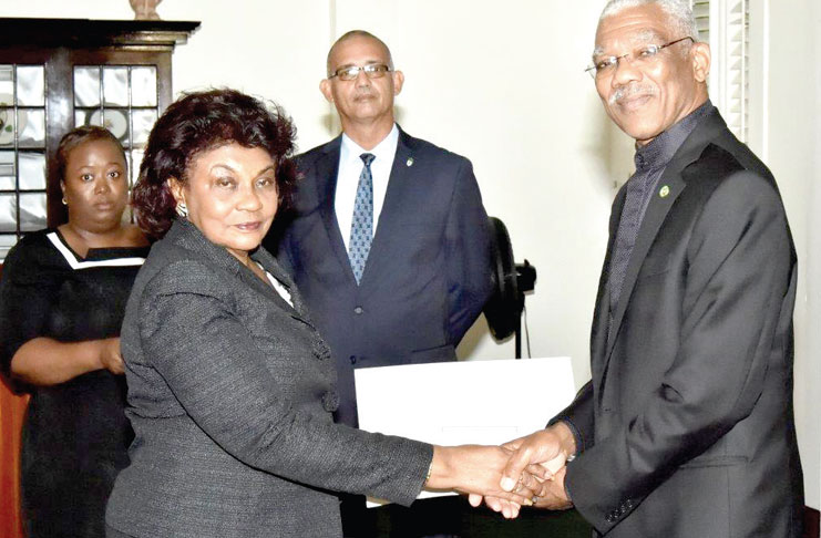President David Granger on January 11, 2017 presented to Justice Claudette Singh, her Commission of Appointment as Senior
Counsel. Justice Singh was selected as the new GECOM Chairman on Friday. With some 40 years of experience, Justice Singh
is one of the only three women to be appointed Senior Counsel in the history of independent Guyana (Delano Williams photo)