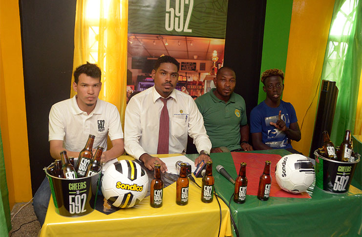 : L-R: Coordinator of the ‘592 Street Kings’ Tournament, Michelangelo Jacobus, 592 Lager Beer Brand Manager Seweon McGarrell and two team’s representatives. (Adrian Narine Photos)