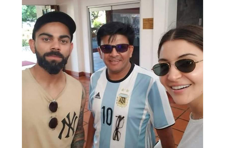 Virat and Anushka with a fan at the Pegasus Hotel