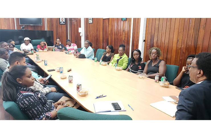 Attorney General and Minister of Legal Affairs, Basil Williams SC meeting with close relatives of the 2008 Lindo Creek Massacre victims at his Office