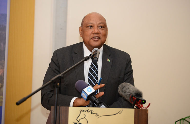 Minister of Natural Resources, Raphael Trotman addressing the opening of the conference on Monday