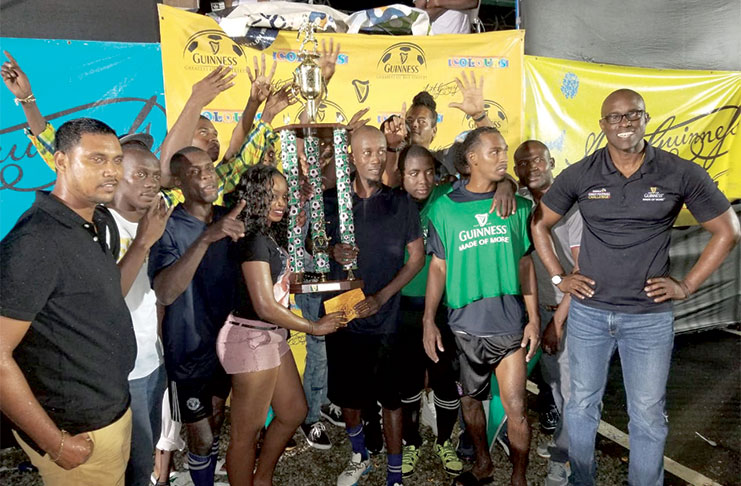 The winning Sparta Boss team poses with their trophy as Guinness Brand Manager Lee Baptiste (right) looks on.