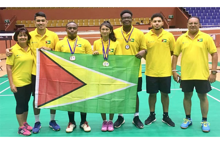 The Guyana badminton team currently in Barbados. Priyanna Ramdhani at the centre.