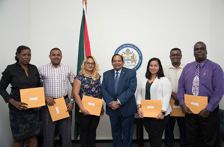 Prime Minister and the new members of the board including its chairperson, Ms. Juretha Fernandes (third from right)