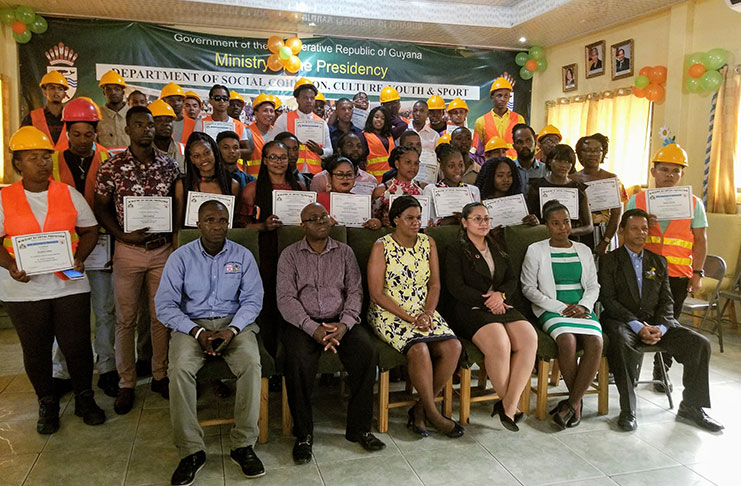 Participants of the Heavy duty equipment and apiculture training showoff certificates with representatives of the Ministry of the Presidency, Department of Social Cohesion, Culture, Youth and Sport and Ministry of Social Protection-Board of Industrial Training.
