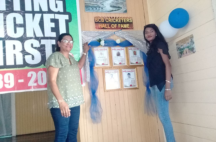 Mrs Mavis Nagamootoo and her granddaughter unveiled the 2019 BCB Hall of Fame portraits.