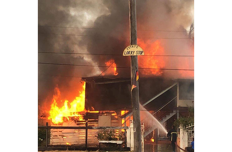 The house engulfed in flames on Wednesday.
