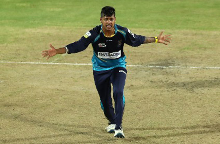 Leg-spinner Sandeep Lamichhane celebrates one of his three wickets in the CPL on Wednesday night. He was later named Man-of-the-Match.