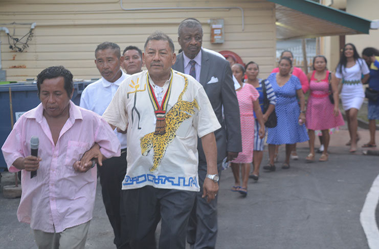 Minister of Indigenous Peoples’ Affairs, Sydney Allicock, along with persons during the religious service