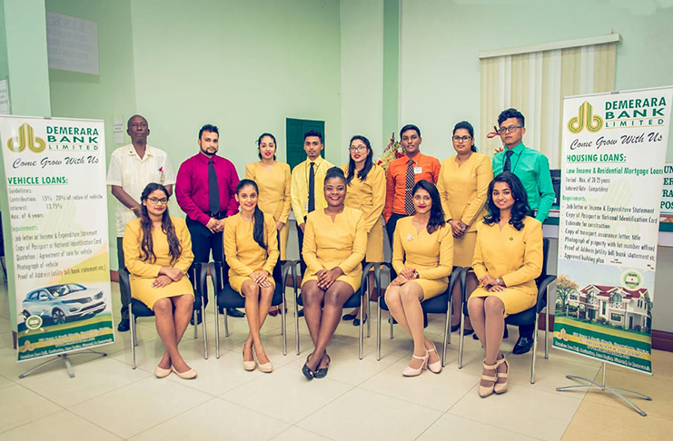 Demerara Bank’s ECD Branch Manager, Shridat Singh (standing second from left) shares a moment with the other staff members