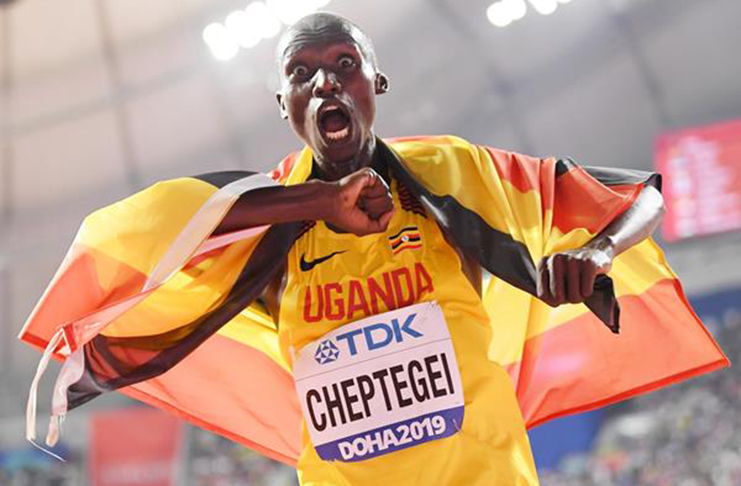 Joshua Cheptegei after taking the 10,000m title at the IAAF World Championships DOHA 2019 (Getty Images)