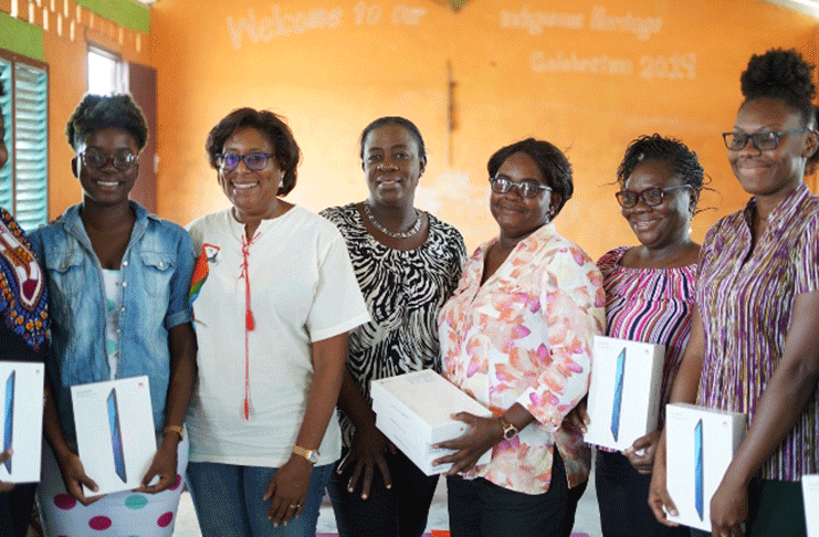 Minister of Education, Dr. Nicolette Henry; Minister of Public Telecommunications, Catherine Hughes and the Headteacher and teachers of Kato Secondary School.