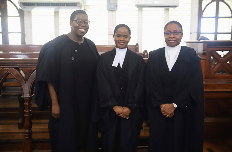 From left: Attorneys Ayana McCalman and Ocelisa Marks with Chief Justice (ag), Roxane George-Wiltshire