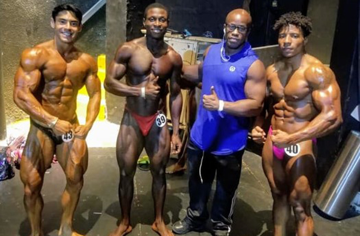 Guyanese Darius Ramsammy (right) with a few of his opponents yesterday in the Dominican Republic.