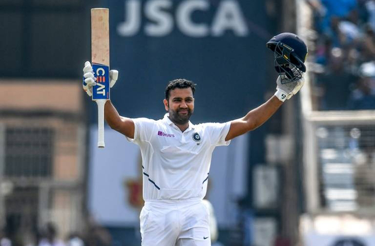 India’s Rohit Sharma celebrates his double century during the third Test against South Africa at Jharkhand State Cricket Association Stadium in Ranchie on Sunday. (AFP PHOTO)