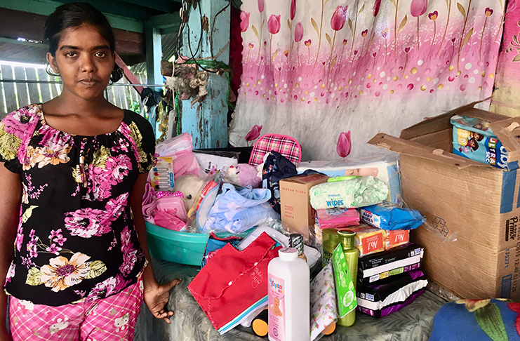 Seema Bisnauth with some of the items she received