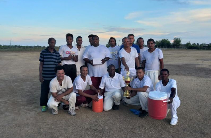 The winning Sandhills/Friendship cricket team pose after the match.