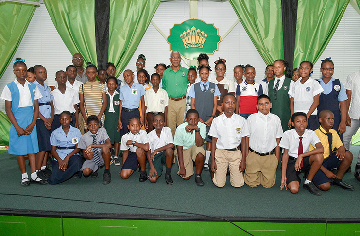 President David Granger (Centre) with beneficiaries