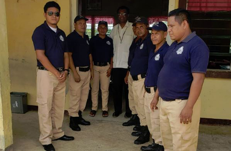 Minister of Public Security, Hon. Khemraj Ramjattan, and some members of the White Water Community Policing Group (CPG)