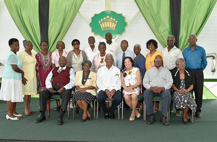 From third left, President David Granger, First Lady, Mrs. Sandra Granger and President of the Government Pensioners Association of Guyana, Mr. Kerry Barker, with the Association's Executive and Committee members.