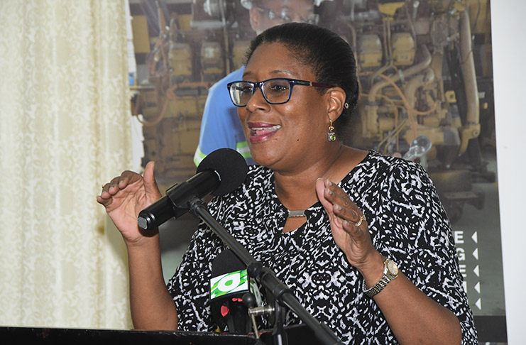 Minister of Public Telecommunications Catherine Hughes
