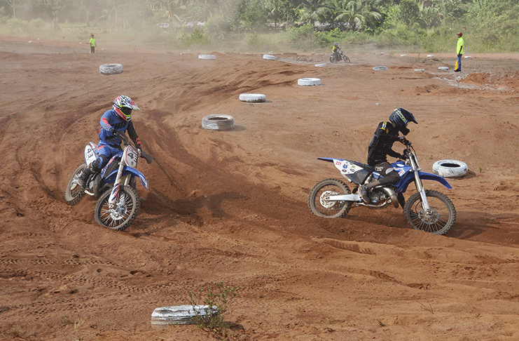 David De Nobreiga in chase of Nickoce Wilson at the Battle of Champions Motocross race on Sunday(Stephan Sookram photo)