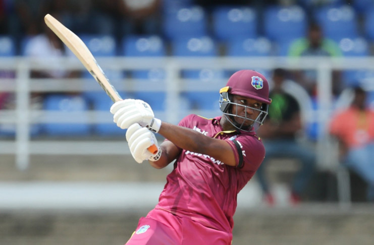 Evin Lewis goes on the attack during his top score of 68 in the opening T20 International yesterday.