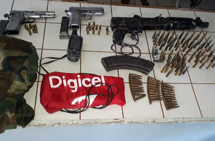 The firearms and other illegal items that were seized by cops
