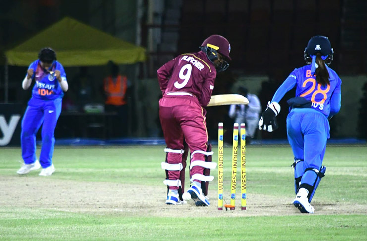 Windies’ Afy Fletcher looks back as her stumps is disturbed by a beauty from Radha Poonam Yadav (Adrian Narine photos)