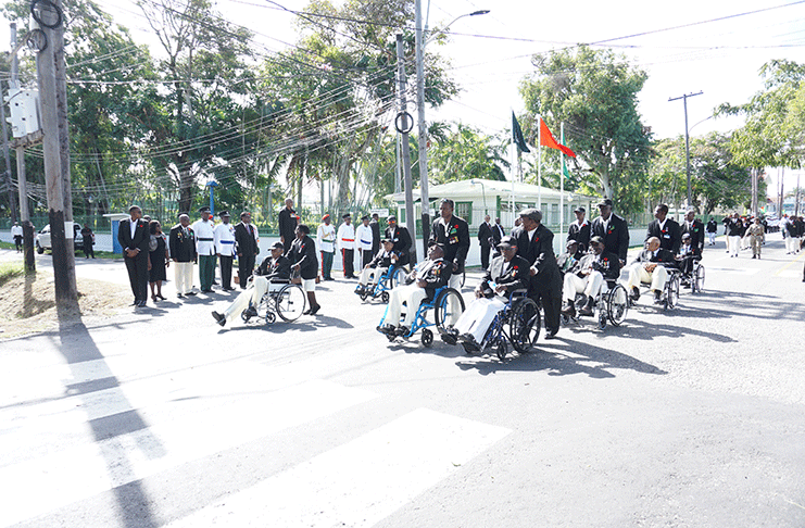 World War II veterans pass President David Granger
on Main Street, Georgetown at the conclusion of the
Remembrance Day ceremony. (Photo by Elvin Croker)