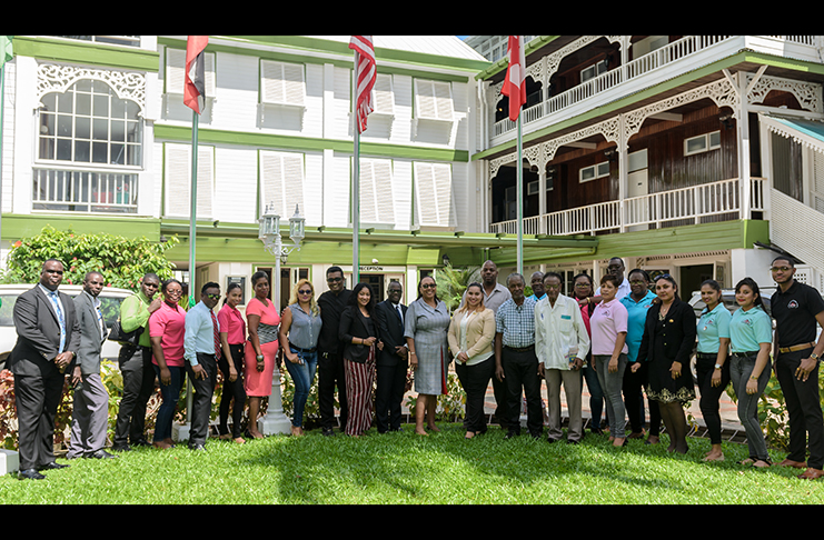 Staff and management of the GNNL in a group photo outside the Cara Lodge.