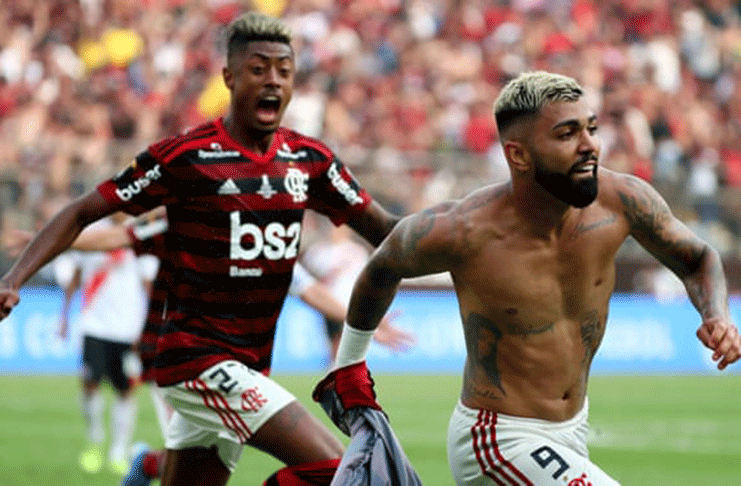Gabriel Barbosa celebrates scoring Flamengo’s winning goal in injury time of the Copa Libertadores final against ( Pilar Olivares/Reuters)