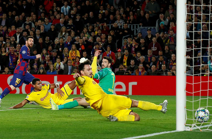 Barcelona's Lionel Messi scores their second goal at Camp Nou, Barcelona, Spain. (REUTERS/Albert Gea)