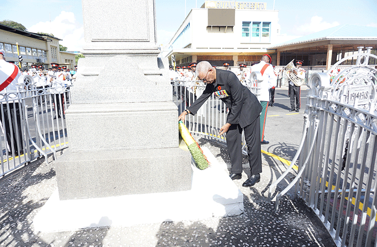President Granger lays the first wreath at the War Memorial/Cenotaph, paying homage to those who gave their lives in service to the Commonwealth during WWI & II