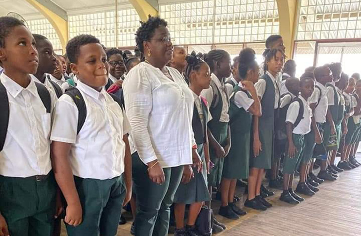Minister Simona Broomes interacting with the students of the Mackenzie High School