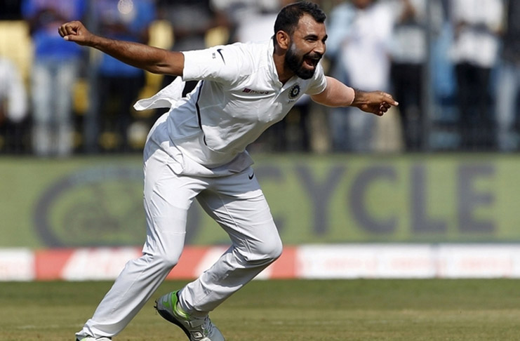 India's Mohammad Shami celebrates the dismissal of Mosaddek Hossain during the opening day of the first Test in Indore on Thursday.