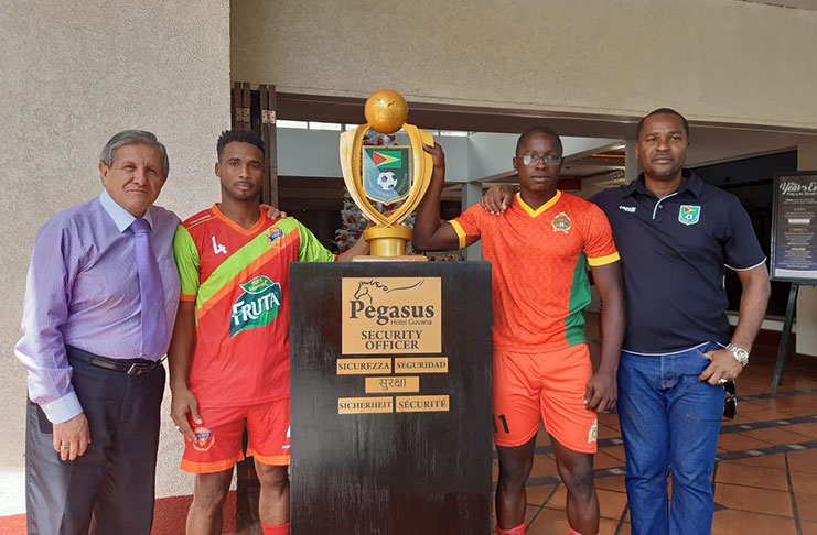 The captains pictured with GFF president Wayne Forde (right) and Pegasus Hotel Manager Carlos Montenegro.