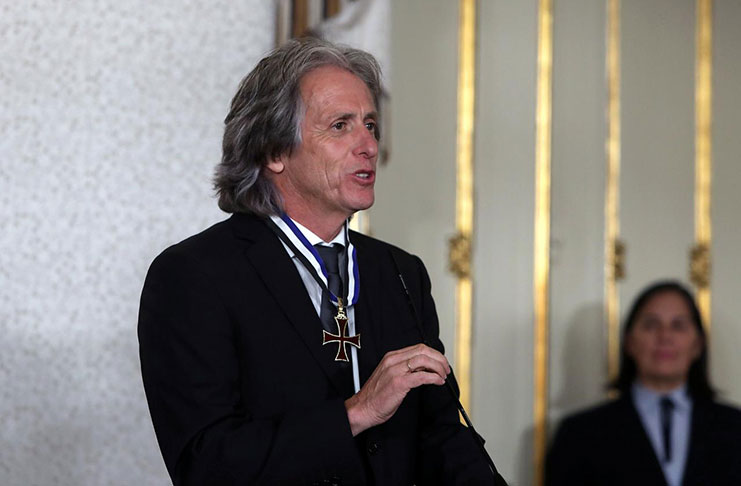 Portuguese coach Jorge Jesus talks to the press after being awarded the Ordem do Infante D. Henrique (The Order of Prince Henry) by Portugal's President Marcelo Rebelo de Sousa, in Belem Palace, Lisbon, Portugal, Monday.